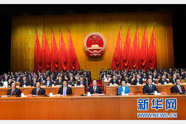 10月1日，慶祝中華人民共和國成立66周年暨新疆維吾爾自治區成立60周年大會在新疆人民會堂隆重舉行。 新華社記者 饒愛民 攝