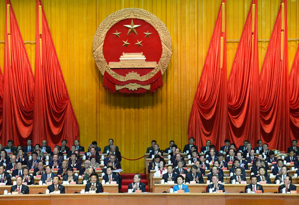 10月1日，慶祝中華人民共和國成立66周年暨新疆維吾爾自治區成立60周年大會在新疆人民會堂隆重舉行。 新華社記者 高潔 攝 