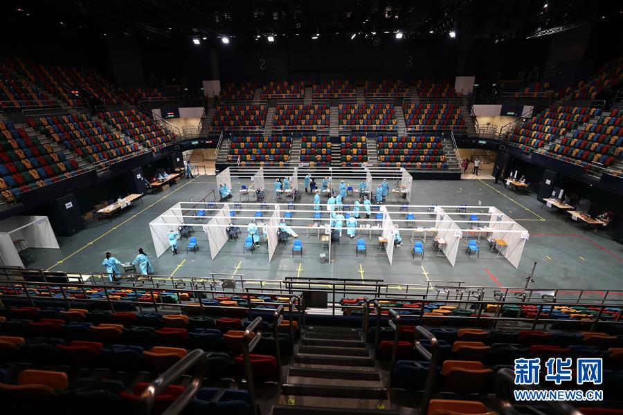 (圖文互動)(1)“身為醫(yī)護(hù)人員一分子,應(yīng)該出來幫忙”——參與新冠病毒社區(qū)檢測的香港醫(yī)護(hù)人員速寫