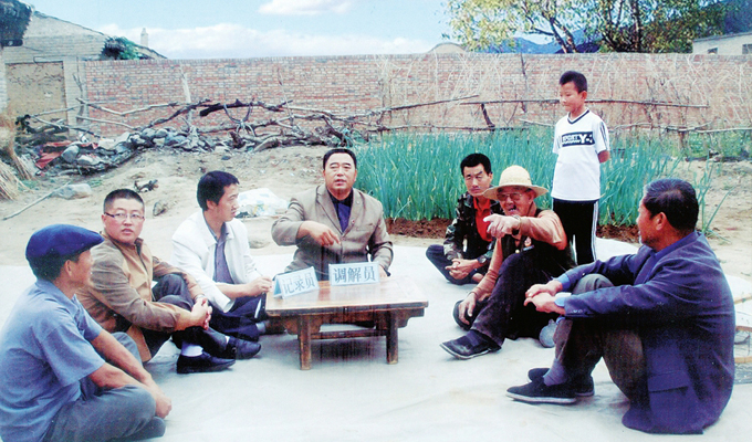 調解&ldquo;家長里短，雞毛蒜皮&rdquo;的小事情是李培斌從事的大事業